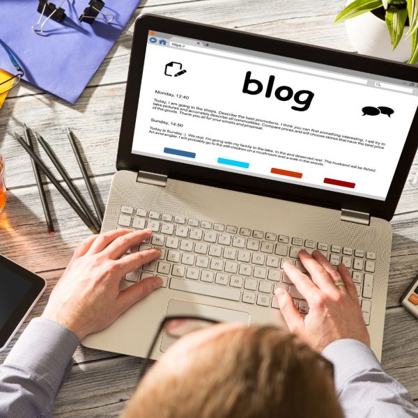 Man Typing on Laptop Keyboard, Creative Blog Writing Concept
