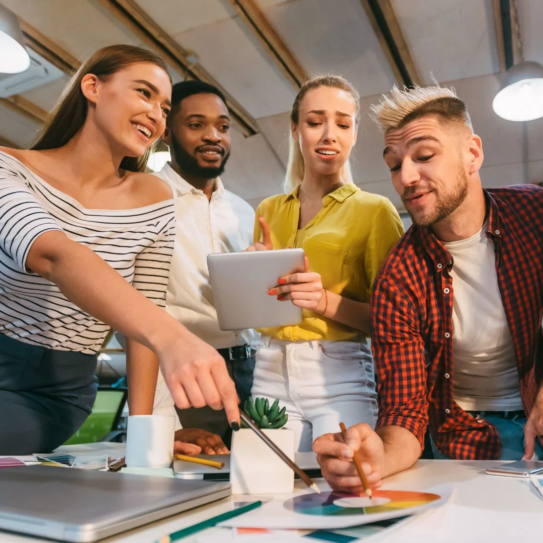 An SEO agency. Young team brainstorming in the office.