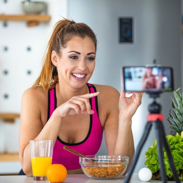 a social media influencer recording a video